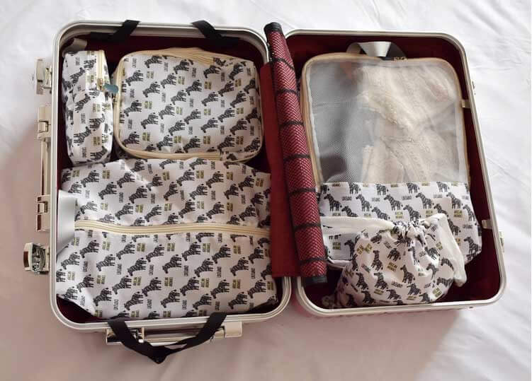 travel packing cube set in suitcase